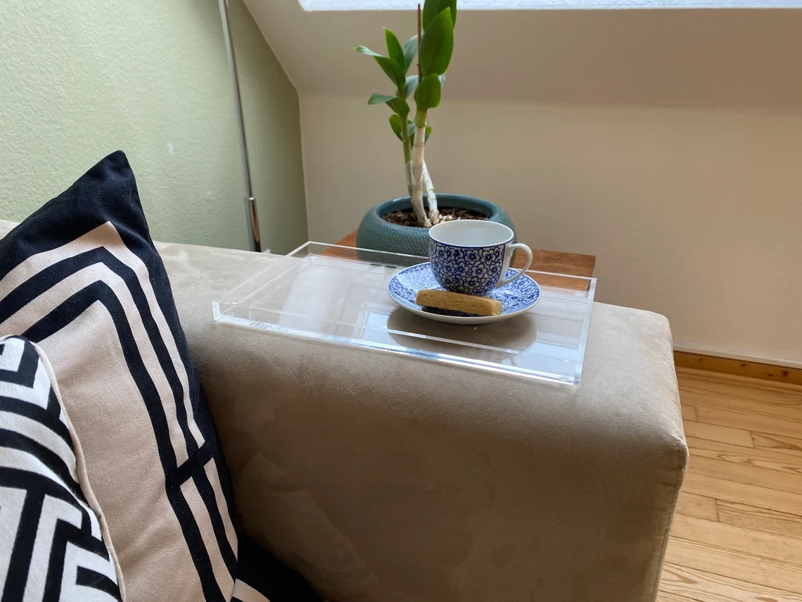 Acrylic tray for storing cosmetics, glasses or utensils on the desk